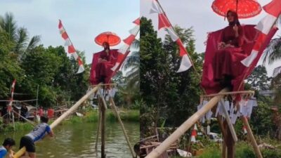 Lomba Panjat Pinang Berhadiah Janda Muda